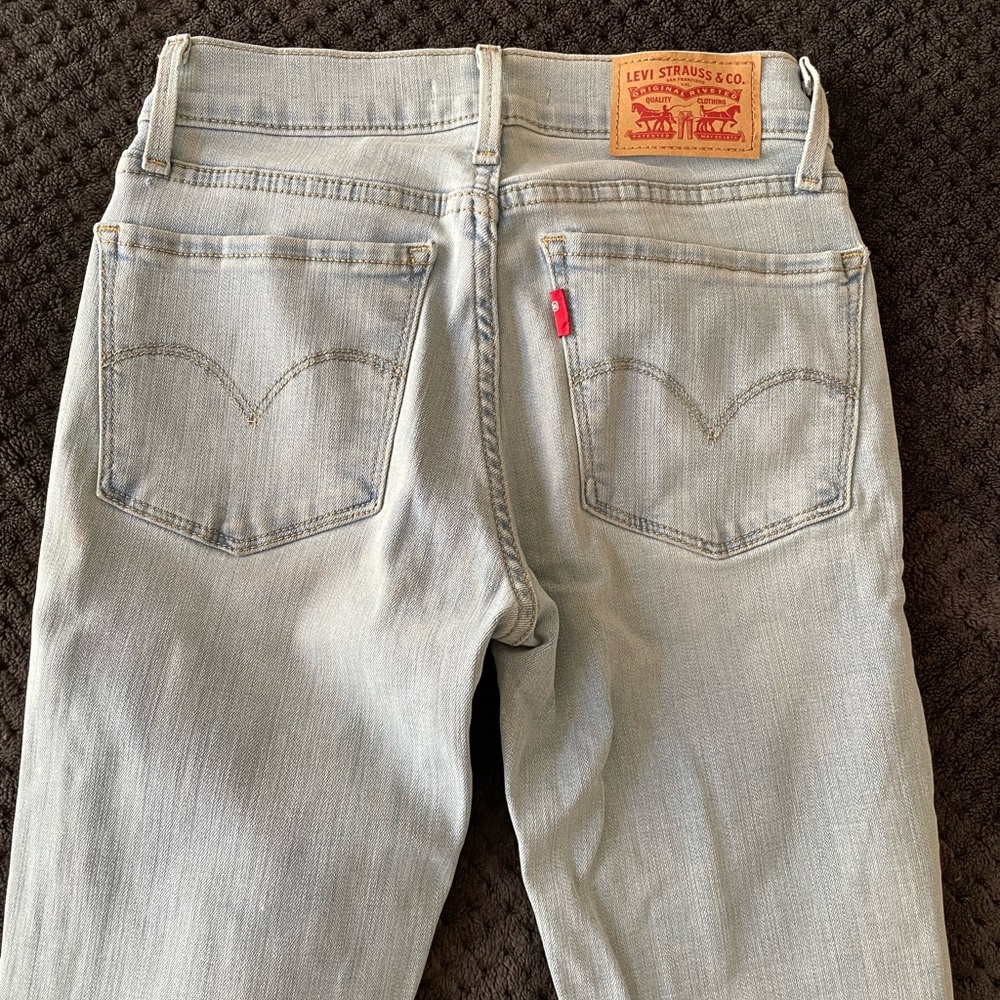 Levis skinny jeans in size 24. Never worn, without tags.
